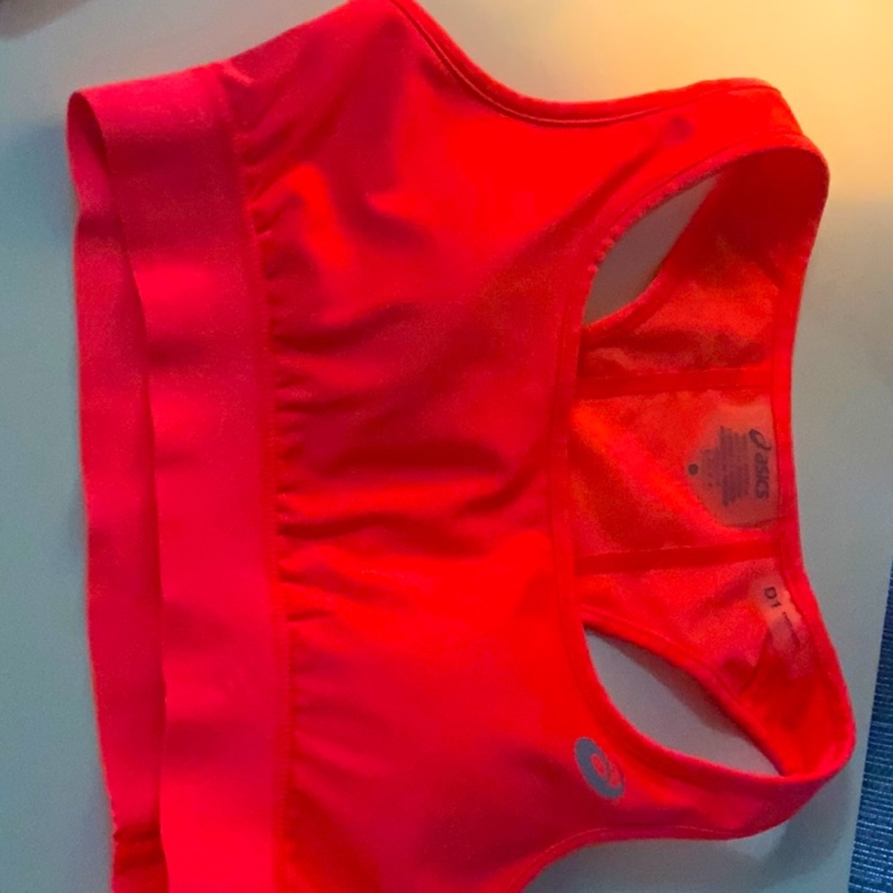 Orange ASICS sports bra